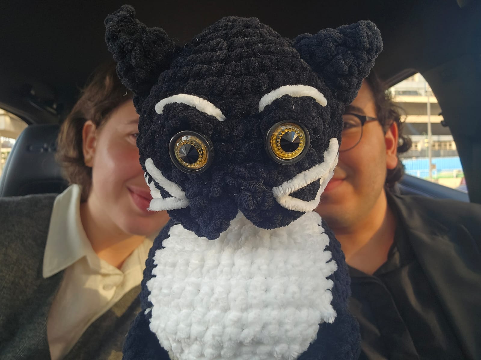Mark and Suf holding Uni Plush